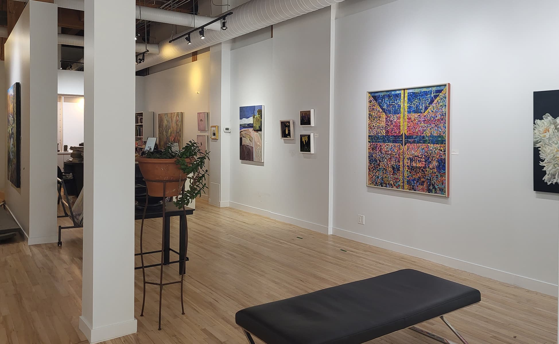 Interior image 1 of Wallace Galleries with several works by Robert Marchessault, Jennifer Hornyak, and Bruce Head